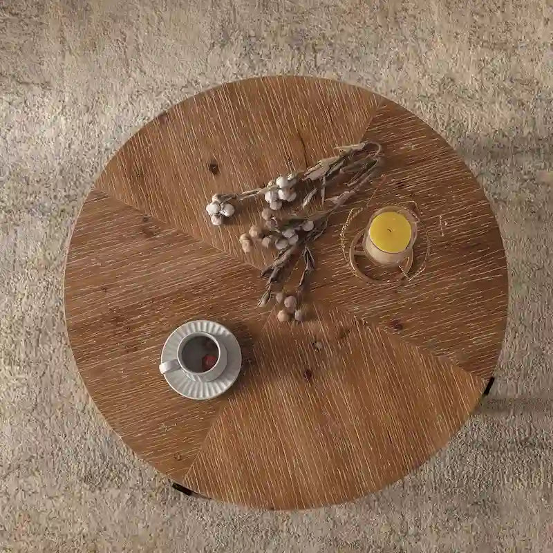 Table basse ronde avec plateau en bois et pieds croisés en métal