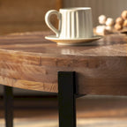 Table basse ronde avec plateau en bois et pieds croisés en métal