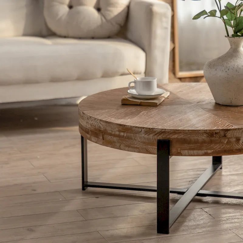 Table basse ronde avec plateau en bois et pieds croisés en métal