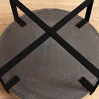 Table basse ronde avec plateau en bois et pieds croisés en métal