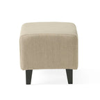 Fauteuil club en tissu touffeté beige clair avec pouf