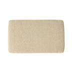 Fauteuil club en tissu touffeté beige clair avec pouf