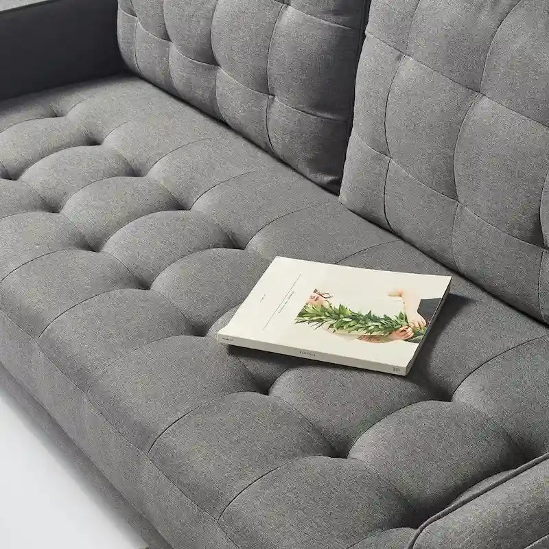 Canapé rembourré avec capitonnage quadrillé
